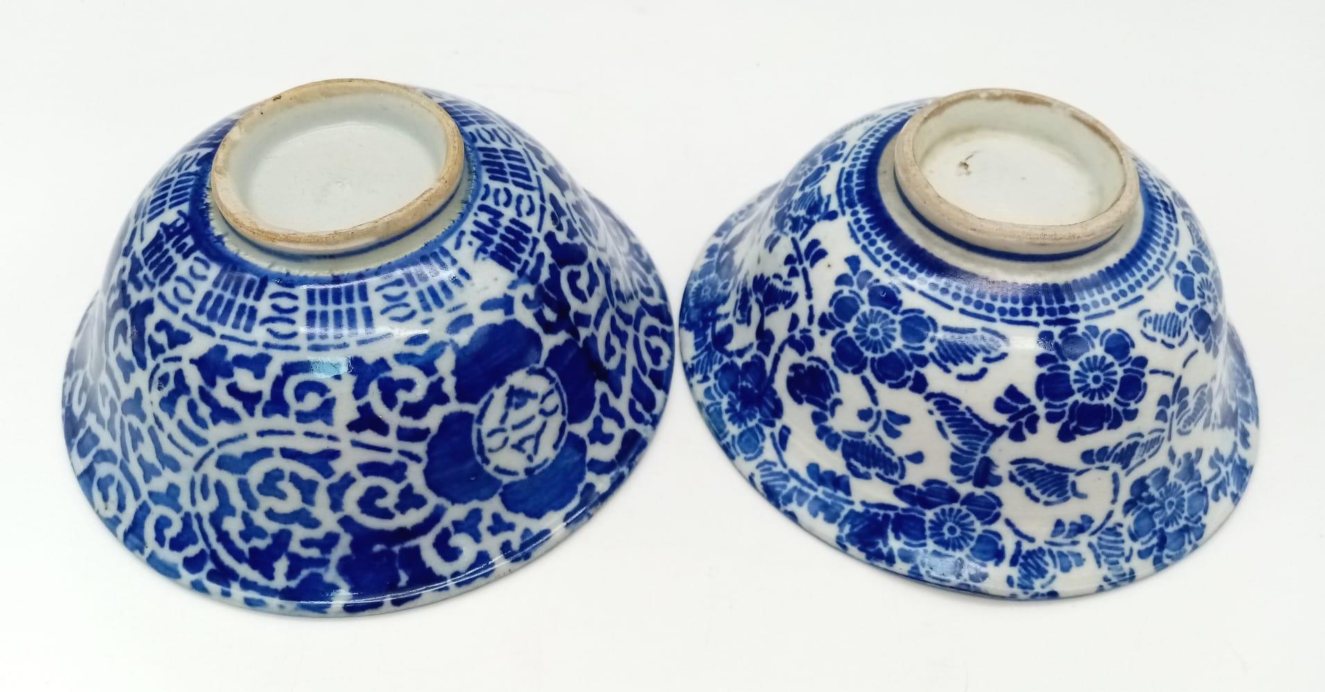 Two 15th Century Chinese Blue and White Rice Bowls. 13cm diameter. Please see photos for