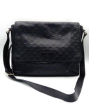 A Gucci Monogram Guccissima Medium Black Leather Handbag, Black Canvas Interior with Interior Zip