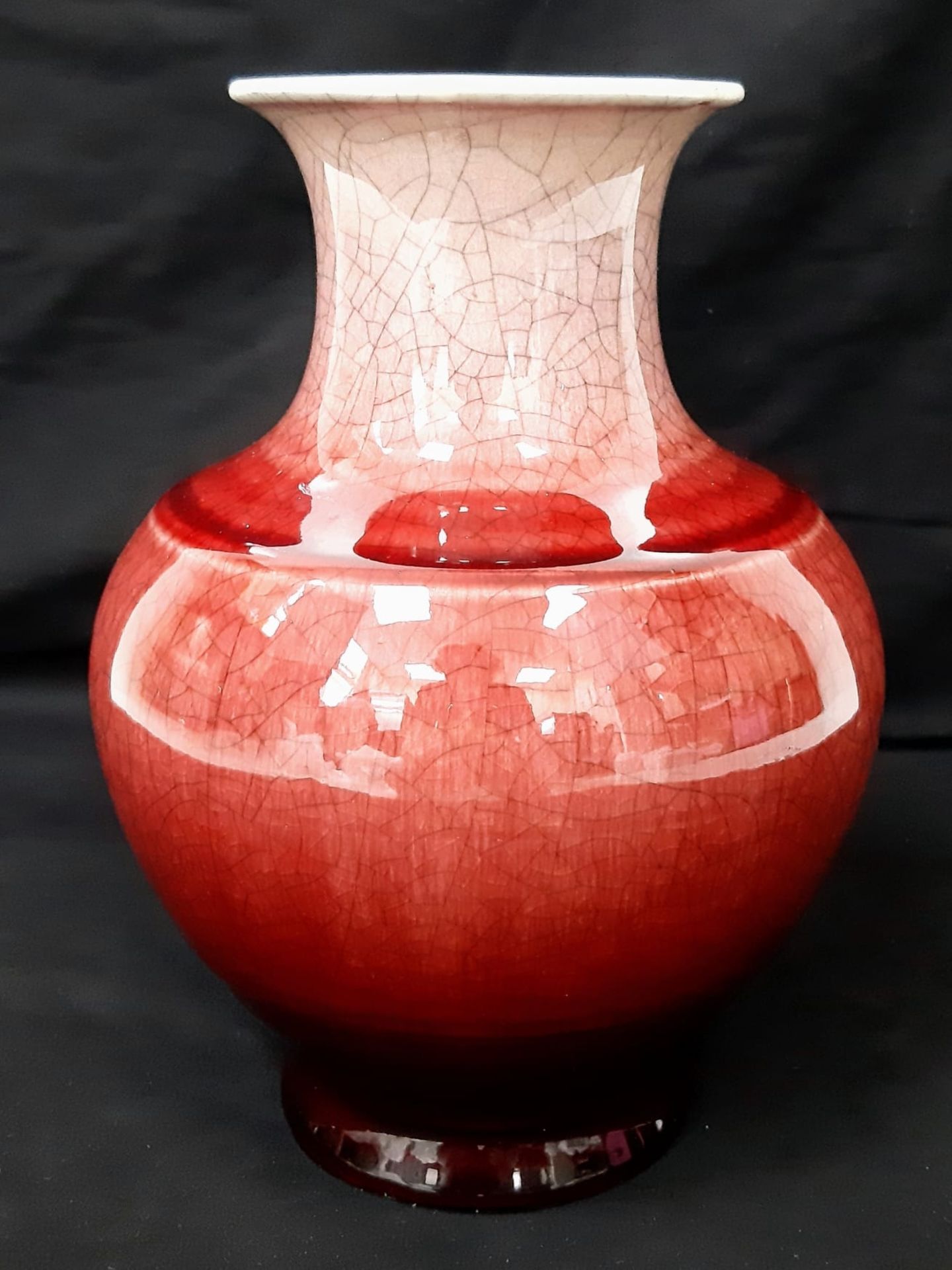 An 18th Century Chinese Red Glaze Yu Hu Chun Porcelain Vase. Beautiful crackle effect throughout.
