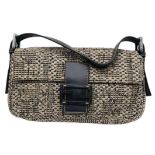 Fendi Woven Baguette Bag. Quality top handle with silver toned hardware. textured woven material