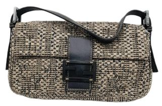 Fendi Woven Baguette Bag. Quality top handle with silver toned hardware. textured woven material