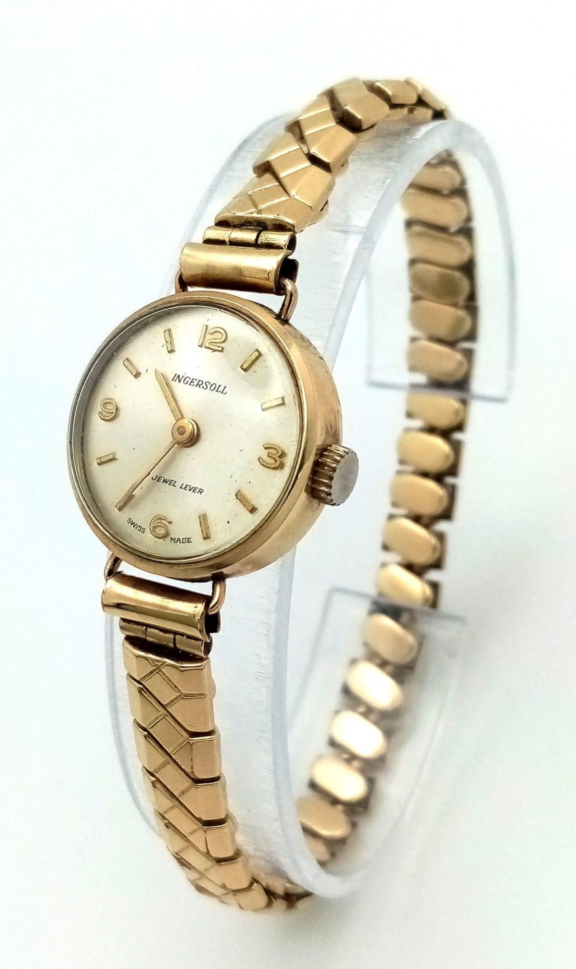 A Vintage 9K Gold Cased Ingersoll Ladies Watch. Rolled gold expandable bracelet. 9K gold case -