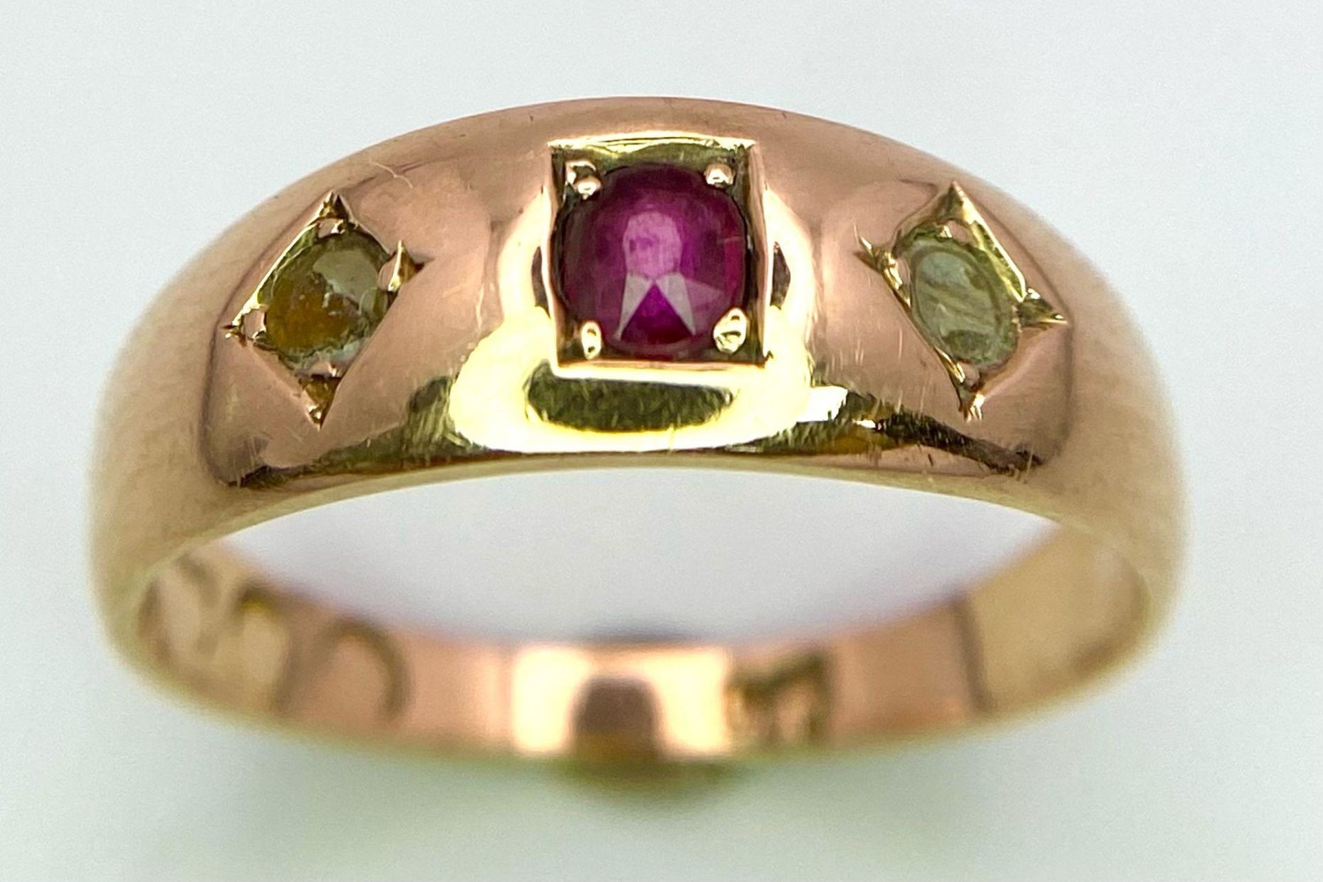 An Antique 15K Gold, Ruby and White Stone Ring. Size N. 3.36g total weight.