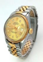 A Rolex Oyster Perpetual Datejust Bi-Metal Gents Watch. 18k gold and stainless steel bracelet and