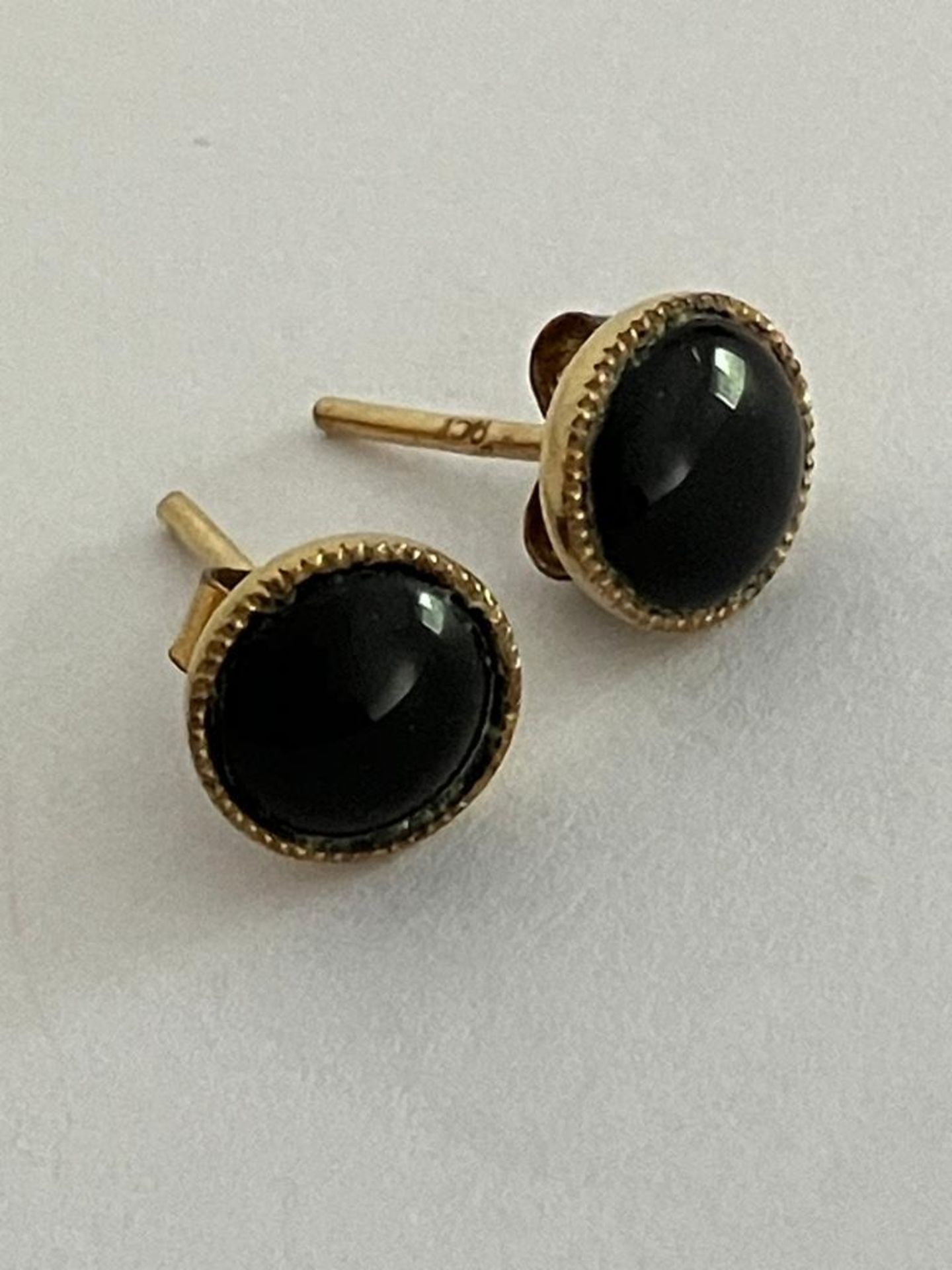 Pair of 9 carat GOLD EARRINGS with Cabachon Black Stone detail. Having 9ct GOLD backs..86 grams.