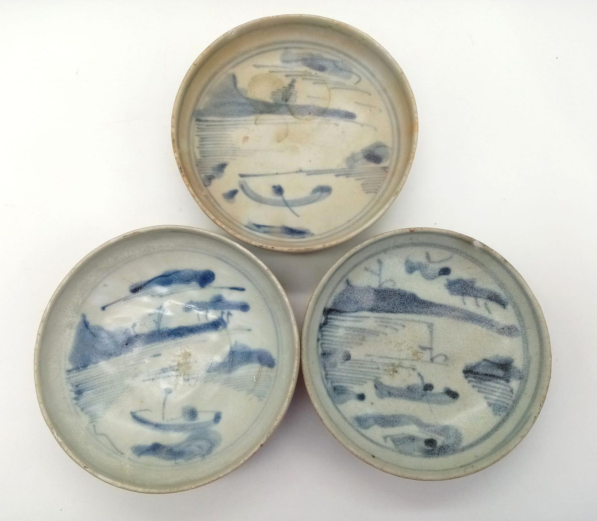 Three 15th Century Chinese Ceramic Sauce Bowls. 11cm diameter.