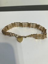 Vintage 9 carat yellow GOLD GATE BRACELET. Complete with GOLD safety chain. Full UK hallmark. 9