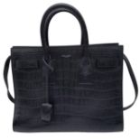 A Saint Laurent Sac de Jour Handbag. Crocodile embossed leather exterior with silver hardware and