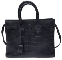 A Saint Laurent Sac de Jour Handbag. Crocodile embossed leather exterior with silver hardware and