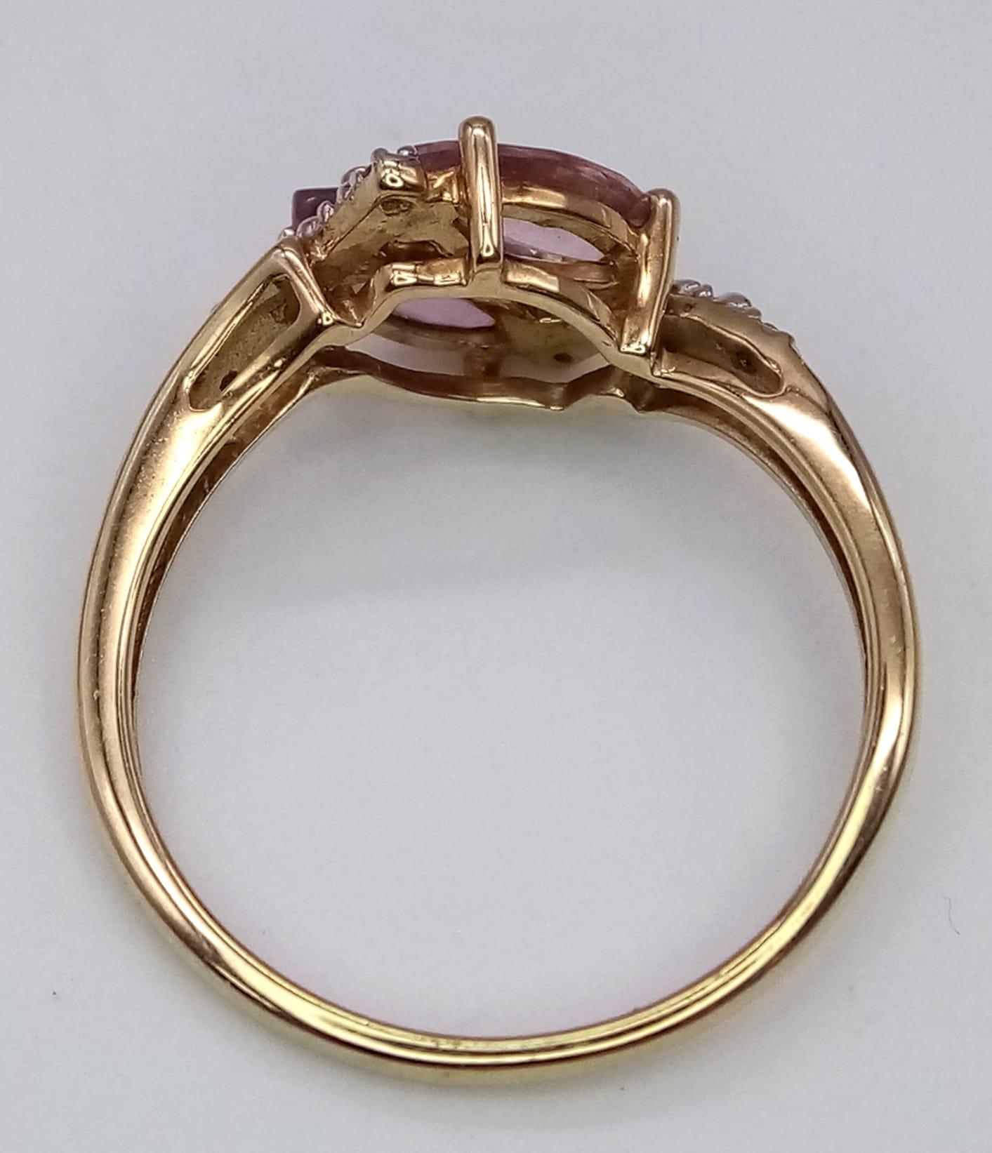 A 10k Yellow Gold, Amethyst and Diamond Crossover Ring. Size N. 2.17g total weight. - Image 3 of 4