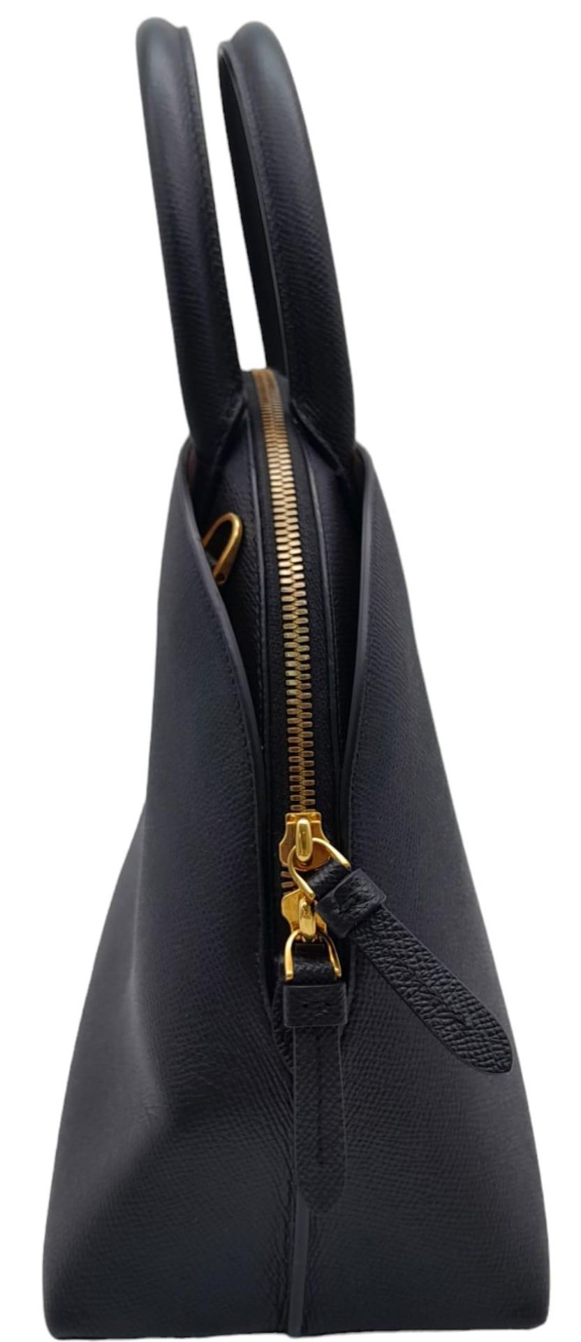 Salvatore Ferragamo Top Hand Bag. Calf leather with rolled top handles, gold tone hardware and two- - Image 3 of 10