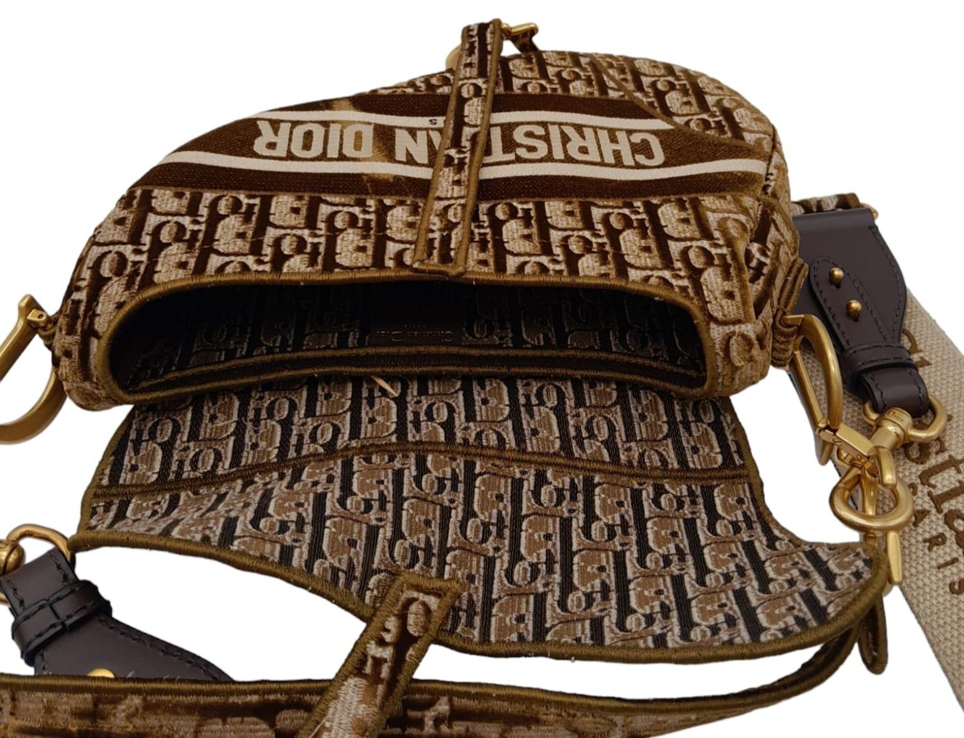 Christian Dior Saddle Handbag. Brown monogrammed velvet bag with gold tone hardware. Additional, - Image 3 of 9