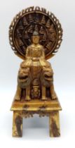 Rare and unusual Antique Chinese Gilt Bronze Statue of a Seated Buddha protected on each side by