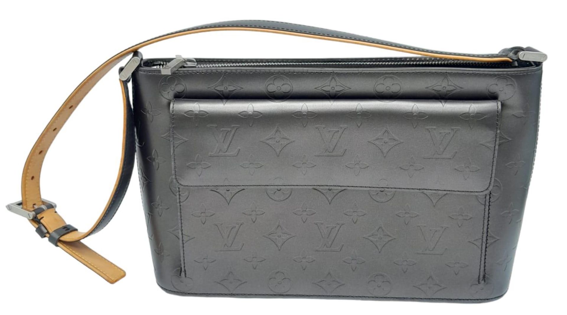 Louis Vuitton Black Leather Handbag. LV monogrammed, silver tone hardware and adjustable 2-toned
