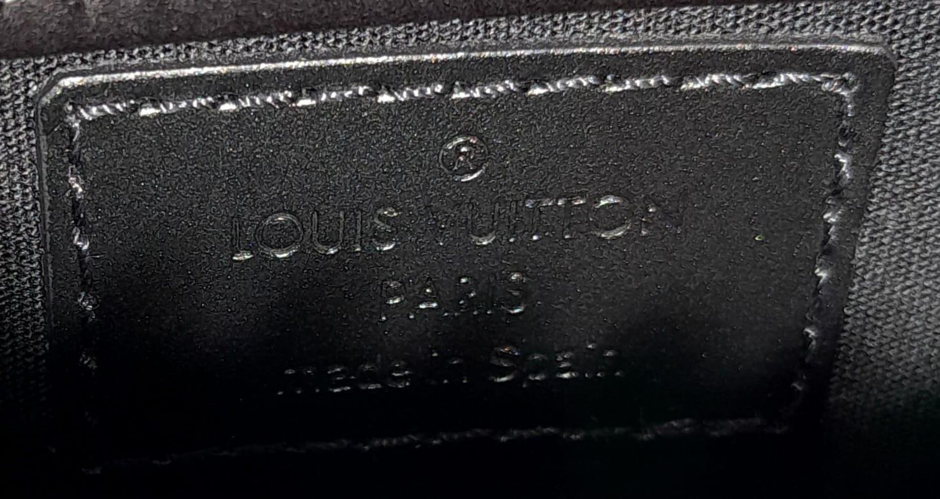 Louis Vuitton Black Leather Handbag. LV monogrammed, silver tone hardware and adjustable 2-toned - Image 7 of 7