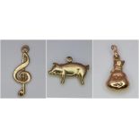 Parcel of three, 9kt Yellow Gold Charm/Pendants. - Money Bag (1cm) - Piggy (1.5cm) - Musical Note