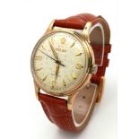 A Vintage (Early 1960s) Rolex Precision 9K Gold Cased Gents Watch. Brown leather strap. 9K gold case