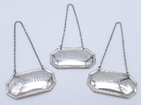 Collection of three Sterling Silver Bottle Tags. All three are hallmarked, featuring a SHERRY,