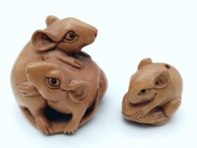 Two Hand-Carved Wood Netsuke Mouse/Mice Figurines. Both have a mark on base. 4cm x 4cm - largest