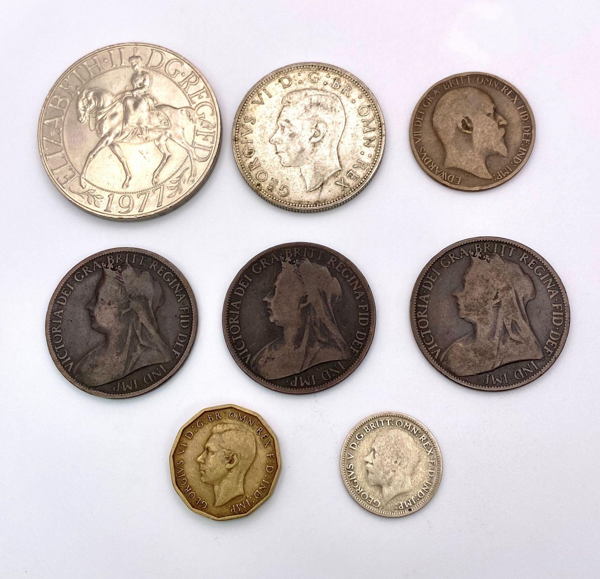 A parcel of 8 interesting British Coins. 1x Elizabeth II, Crown 1977 1x George VI, Half Crown 1943