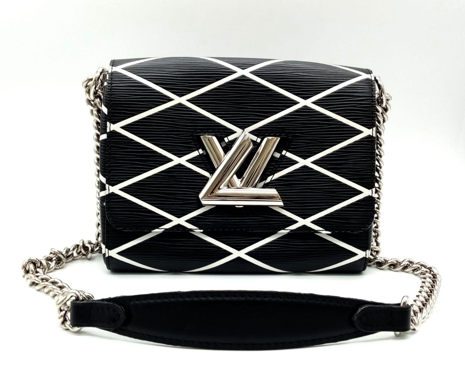 A Louis Vuitton Twist Shoulder Bag in Black Epi Leather with White Diamond Pattern, Silver Coloured