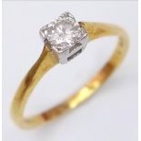 A Vintage 18K Yellow Gold Diamond Solitaire Ring. Brilliant round cut diamond - 0.25ct. Size M. 2.