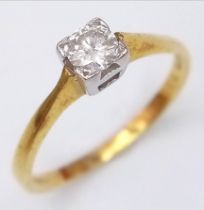 A Vintage 18K Yellow Gold Diamond Solitaire Ring. Brilliant round cut diamond - 0.25ct. Size M. 2.