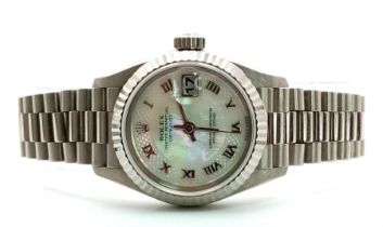 A LADIES ROLEX 18K WHITE GOLD OYSTER PERPETUAL DATEJUST WITH UNUSUAL PATTERNED DIAL , ROMAN NUMERALS