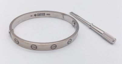 An iconic 18 K white gold CARTIER LOVE bangle in its original presentation box, with the