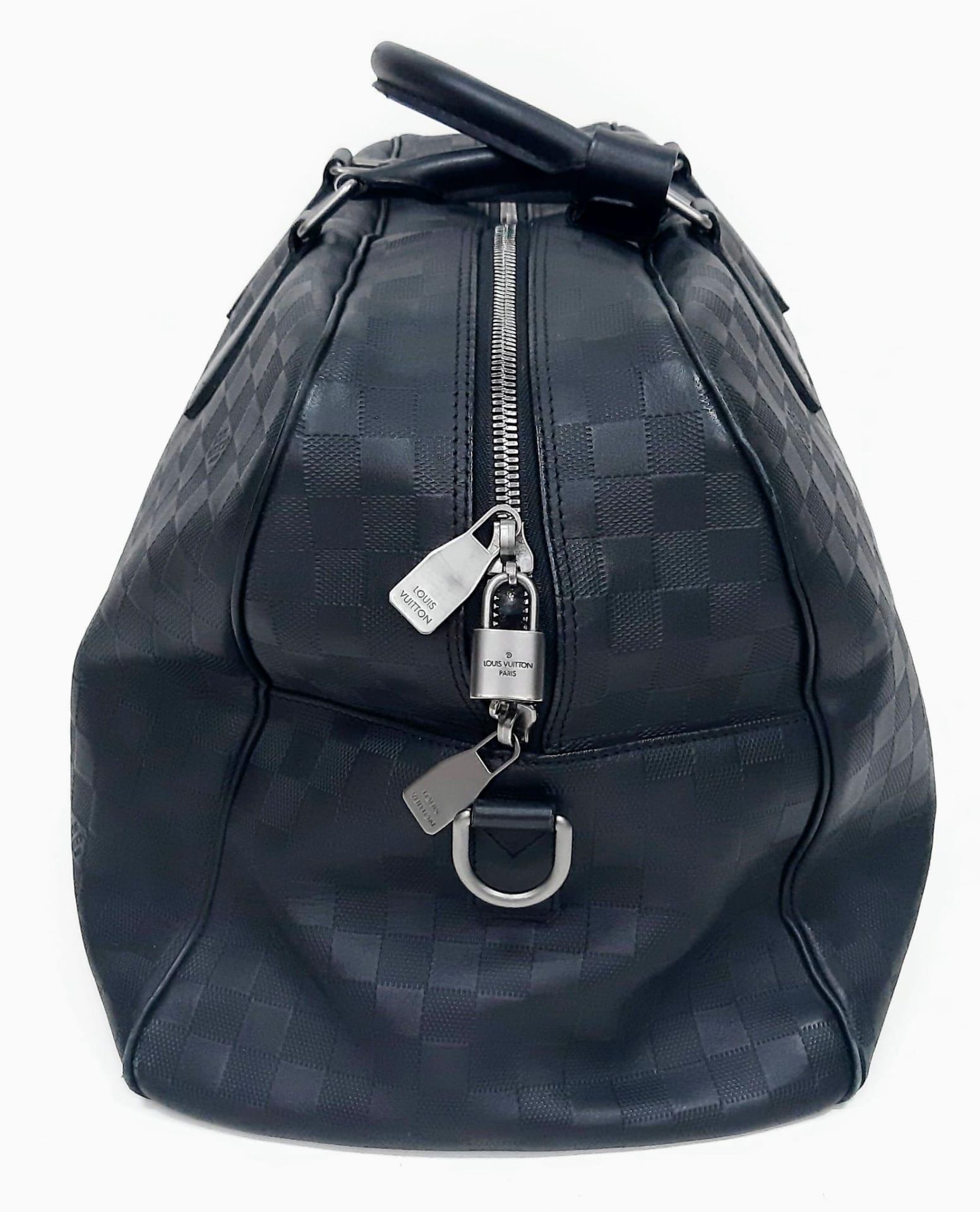 Louis Vuitton Keepall Luggage Bag. Black leather exterior with Silver toned hardware and typical - Image 3 of 8