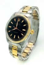 A Vintage Rolex Oyster Bi-Metal Perpetual Datejust Gents Watch. Gold and stainless steel bracelet.