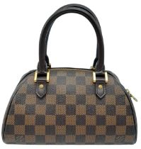 Louis Vuitton Ribera Mini. Quality leather exterior with famed damier checked, damier ebene monogram