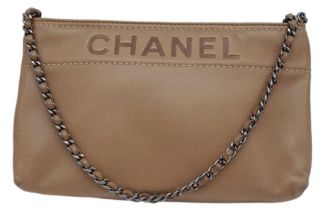 A Vintage Chanel Beige Shoulder Bag. Soft leather exterior, with silver toned hardware, single