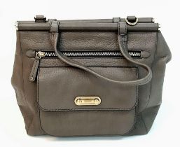 A Tod's Khaki Handbag. Leather exterior, with gold toned hardware, two handles, a flap and twist