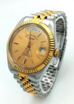 A West End Watch Co. Prima Automatic 25 Jewel Gents Watch. Two tone bracelet and case - 37mm. Gold
