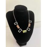 SILVER NECKLACE Having Belcher links with T-bar fastening. Set with Lemon and Morganite Quartz