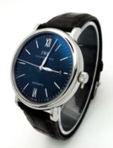 A Sophisticated IWC Portofino Automatic Gents Watch. Original brown leather strap. Stainless steel