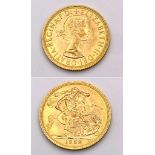 A 1958 Queen Elizabeth II 22K Gold Sovereign. EF.