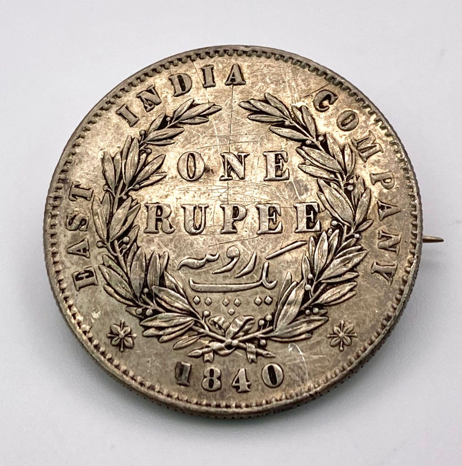 An 1840 Silver One Rupee Coin Brooch.