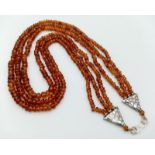 A Three Row Hessonite Garnet Small Rondelle Bead Necklace. 245ctw. 925 Silver Clasp. 40-46cm length.