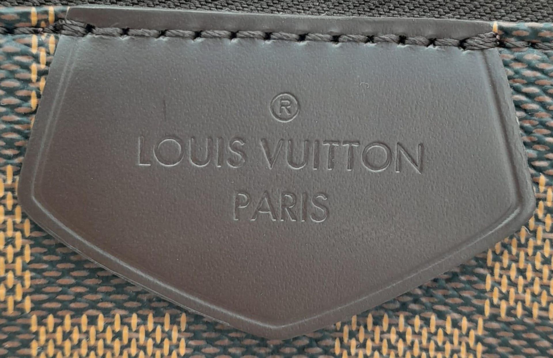 A Louis Vuitton Damier Ebene Brampton Handbag. Leather exterior with two rolled leather handles, - Image 9 of 11
