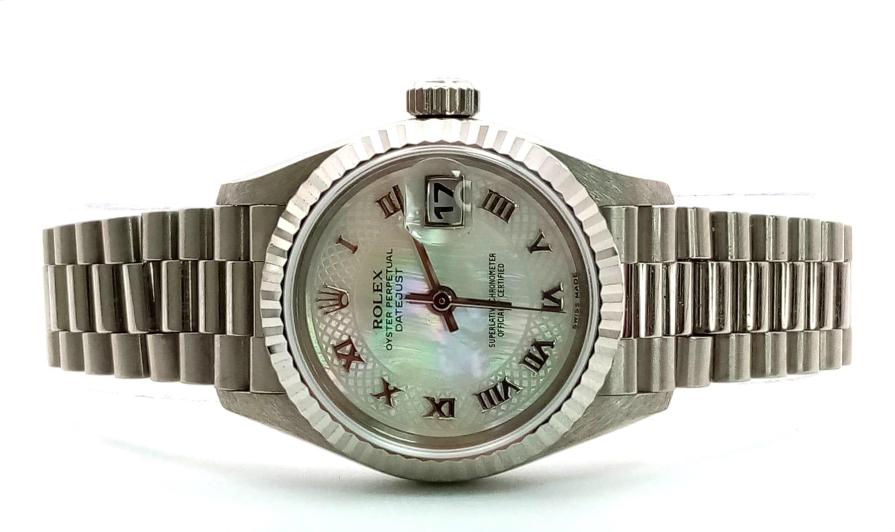 A LADIES ROLEX 18K WHITE GOLD OYSTER PERPETUAL DATEJUST WITH UNUSUAL PATTERNED DIAL , ROMAN NUMERALS