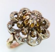 An antique, 14 K yellow gold ring with a fancy cluster of old cut diamonds, ring size: K1/2, weight;