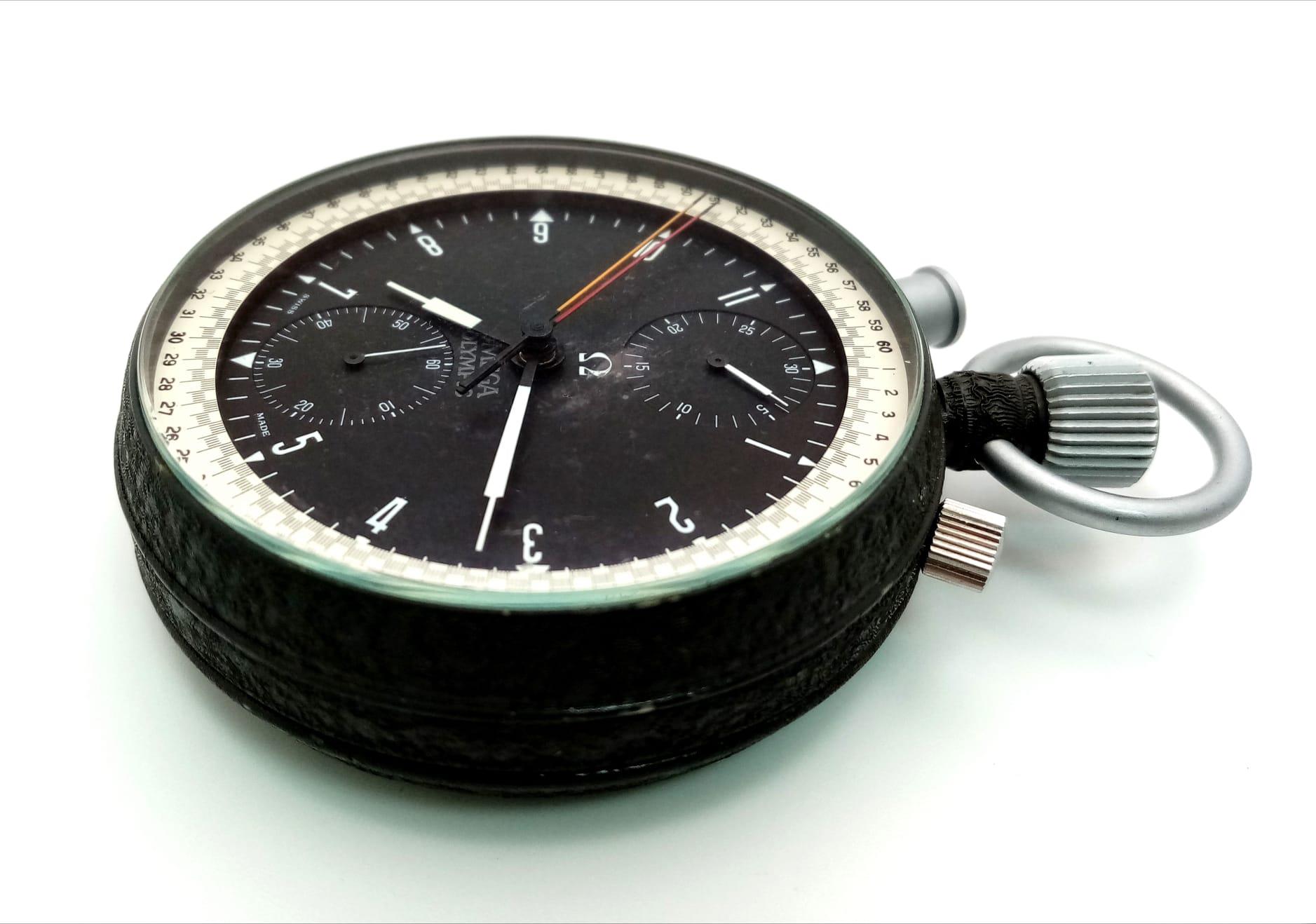 A Rare Vintage Omega Olympic Stopwatch. Top-winder. Black dial with three sub dials - minutes, - Image 2 of 4