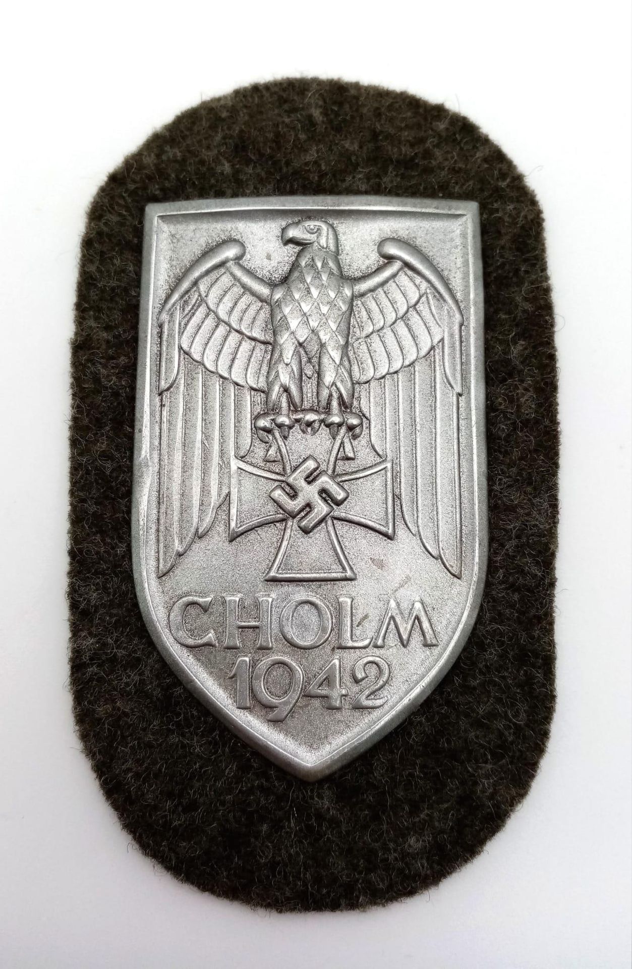 WW2 German Heer (Army) Cholm Campaign Shield in presentation case. Silvered Steel (Magnetic). - Image 2 of 9