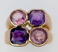 A 14 K rose gold ring with four amethysts. ring size; P, weight: 10 g.