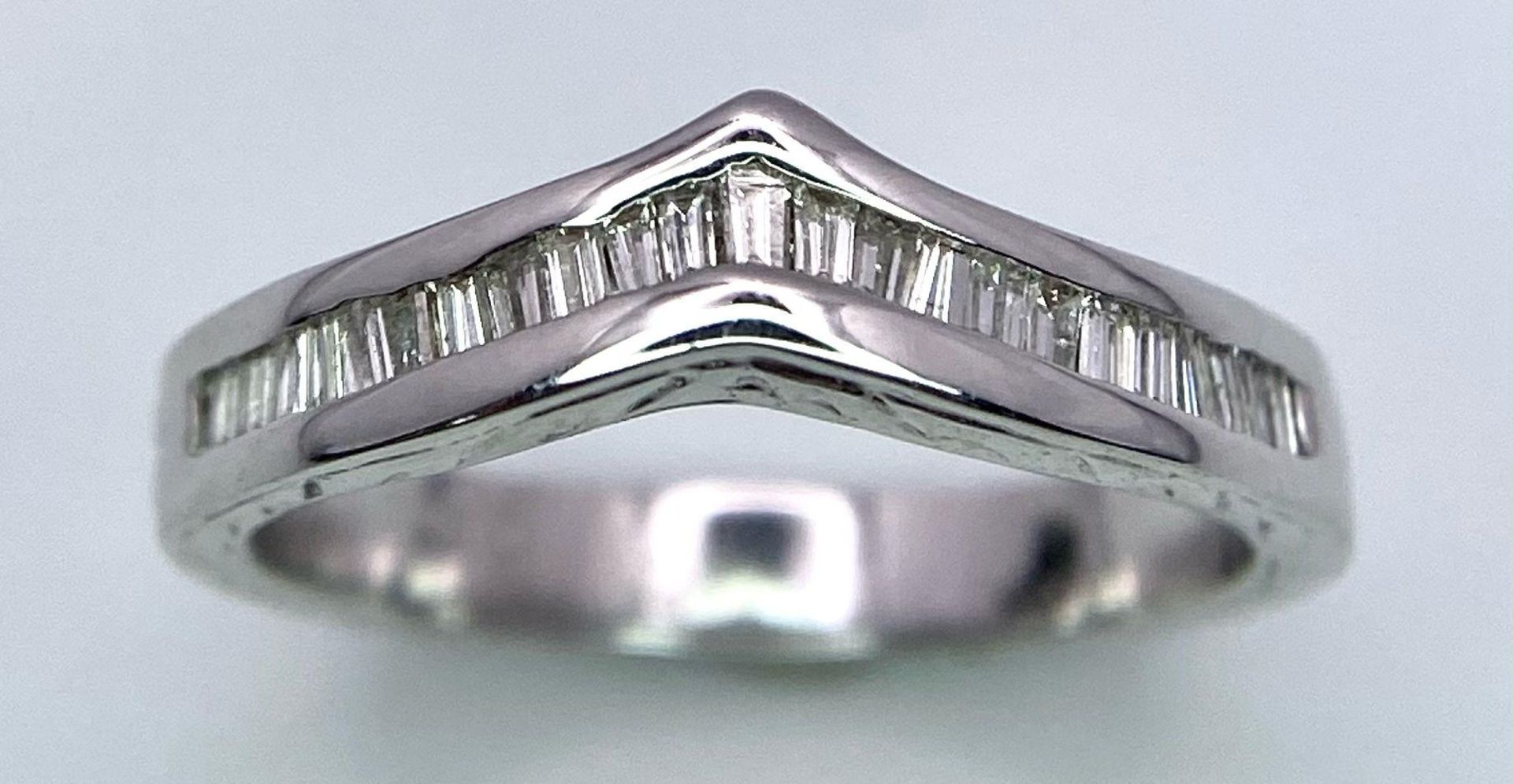 An 18K White Gold Wishbone, Baguette Cut Diamonds, Half Eternity Ring. Size J, 0.30ctw, 3.5g total - Image 2 of 5