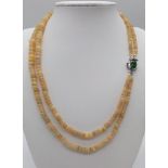 A Two-Row Small Rondelle Opal Gemstone Necklace with Emerald clasp and 925 Silver Clasp. 42-46cm.