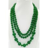 A Rope Length Green Jade Necklace with Different Sized Jade Beads - 8mm and 14mm. Necklace