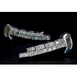 A Pair of 18K White God Diamond Drop Earrings. 26mm length, 0.50ctw, 6.1g total weight.